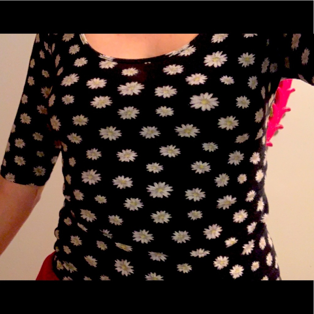 Mid-length black top with small daisies